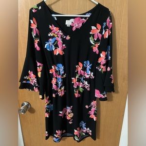 Floral dress with empire waist and bell sleeves. Size small